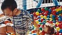 1994-07 06 Ben hauls Kelsey out of the ball pit.jpg