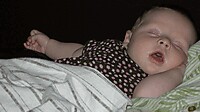 Byllea sleeping in Grandma Janets arms.jpg
