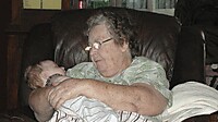 Sleeping baby with Grandma Janet.jpg