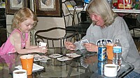 Sydnie playing cards with Grandma Debby.jpg
